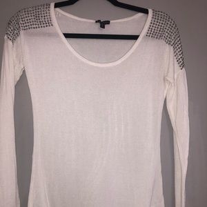 White long sleeve top with shoulder embellishments